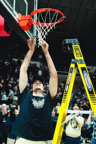 edey giving net to keady|Zach Edey cuts down net without ladder, gives piece to Gene Keady.